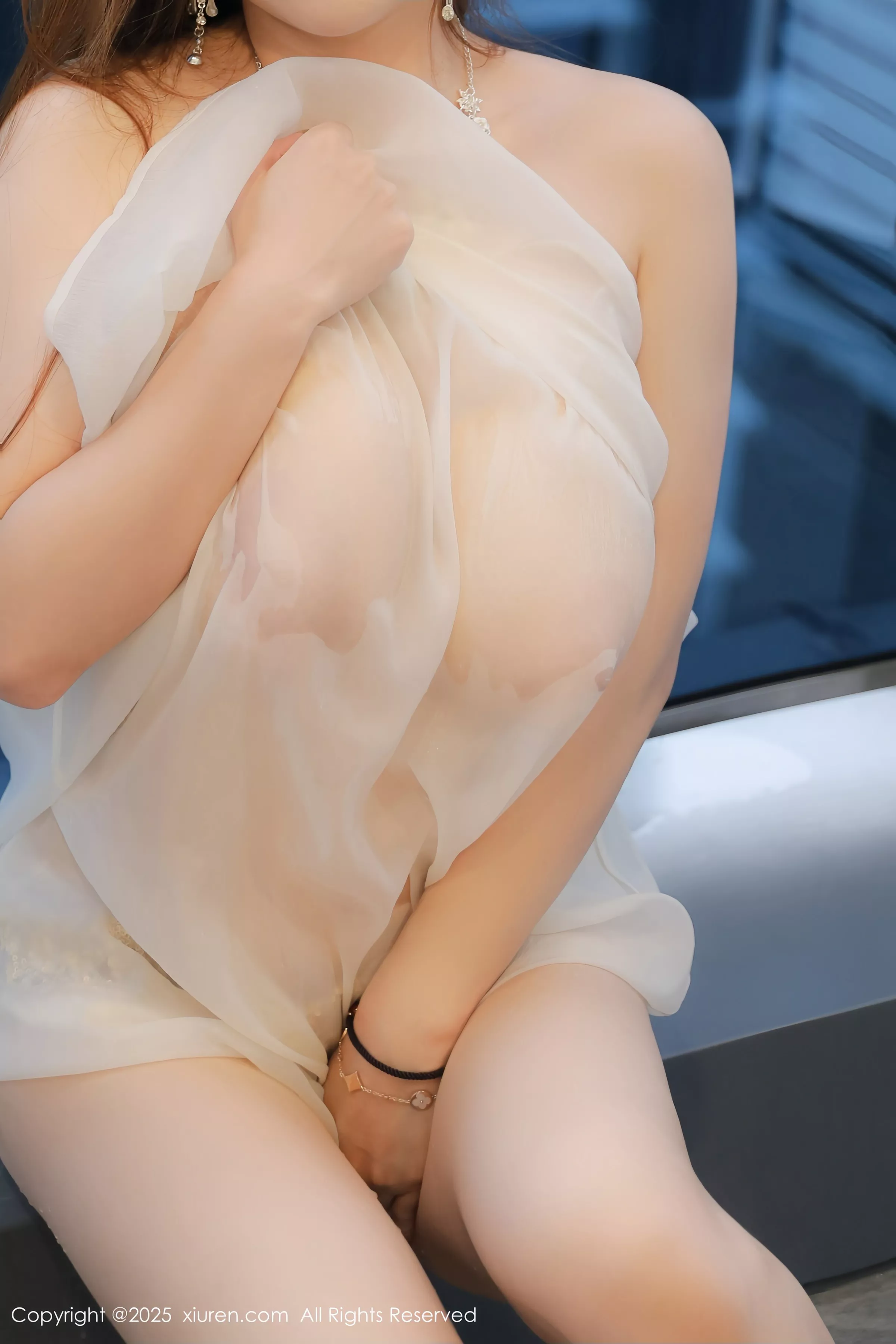  [XiuRen]高清写真图 2025.04.29 No.10218 小肉肉咪 白色泳衣第75张图片