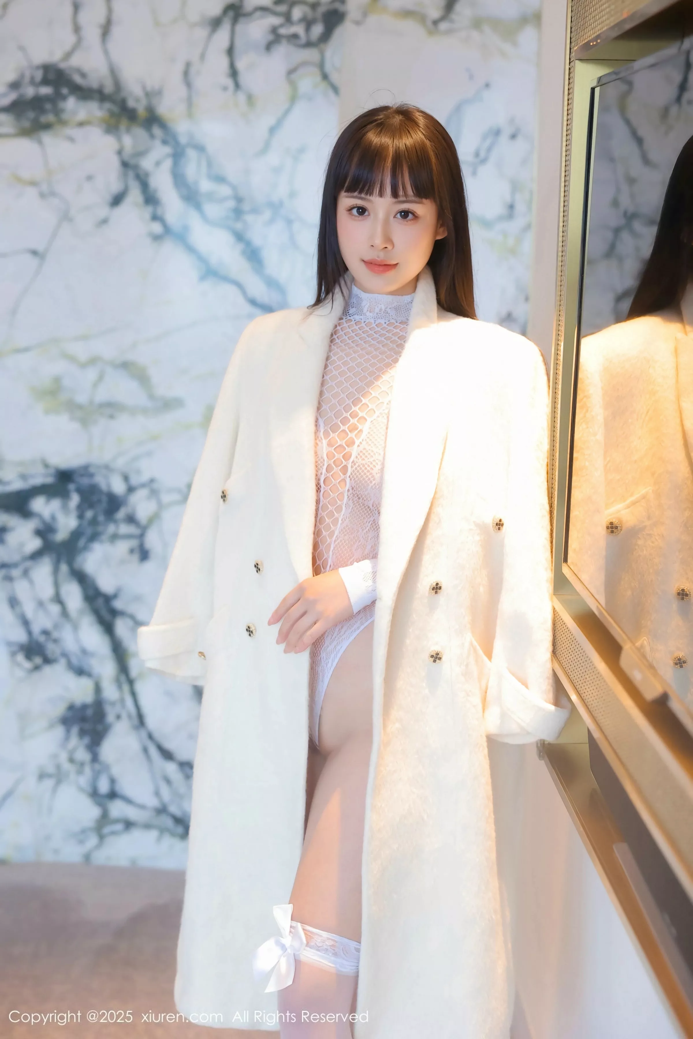   [XiuRen]高清写真图 2025.06.24 No.10454 瓦达西 白色丝袜第1张图片