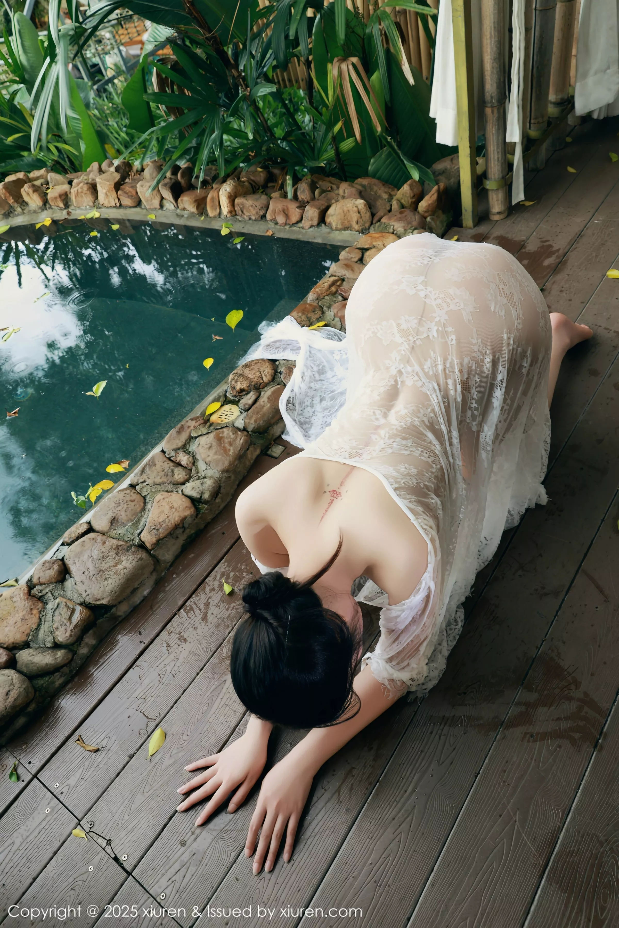   [XiuRen]高清写真图 2025.07.11 No.10538 南乔 绿色旗袍第59张图片