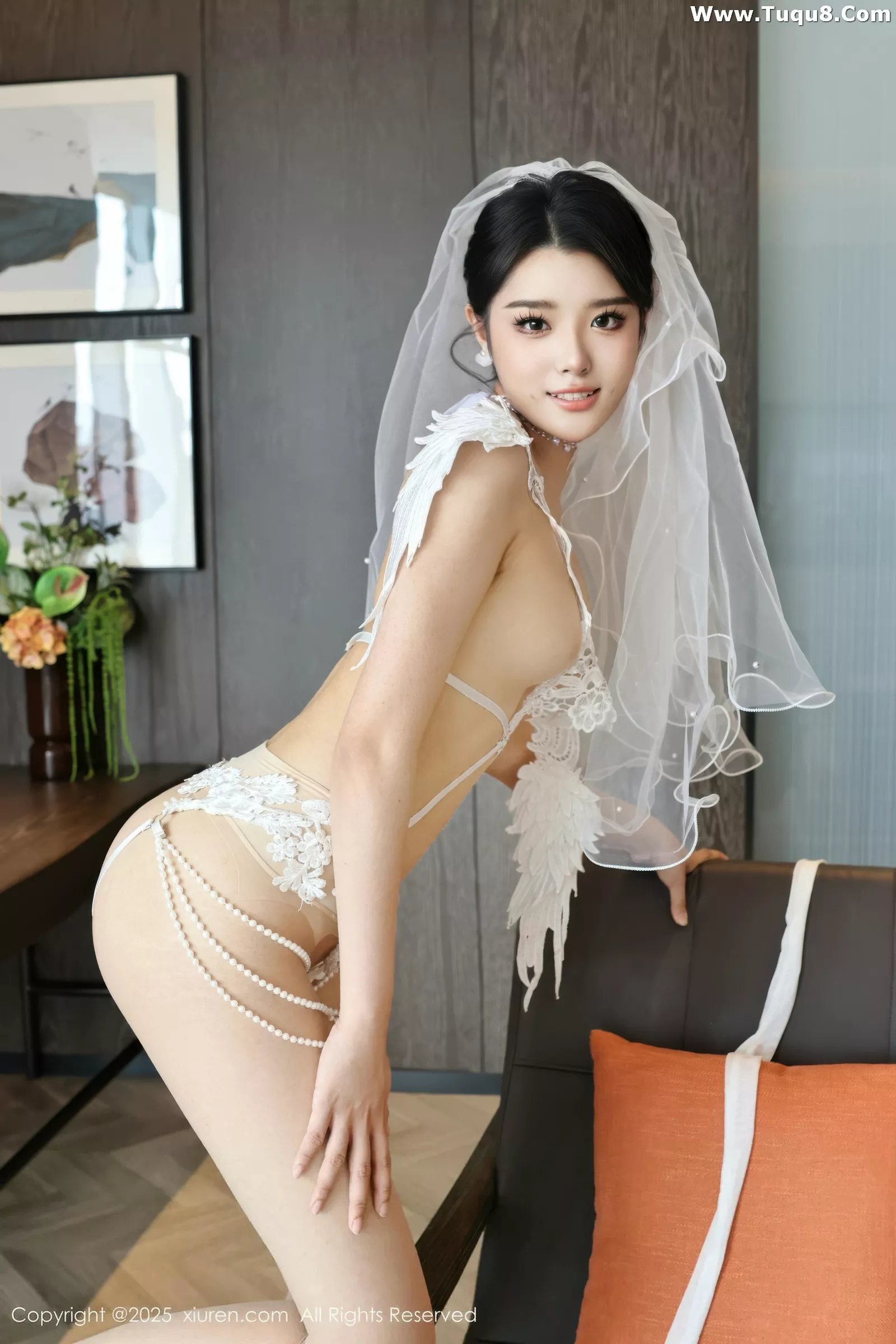   [XiuRen]高清写真图 2025.07.18 No.10559 糯梨子 白色婚纱第33张图片