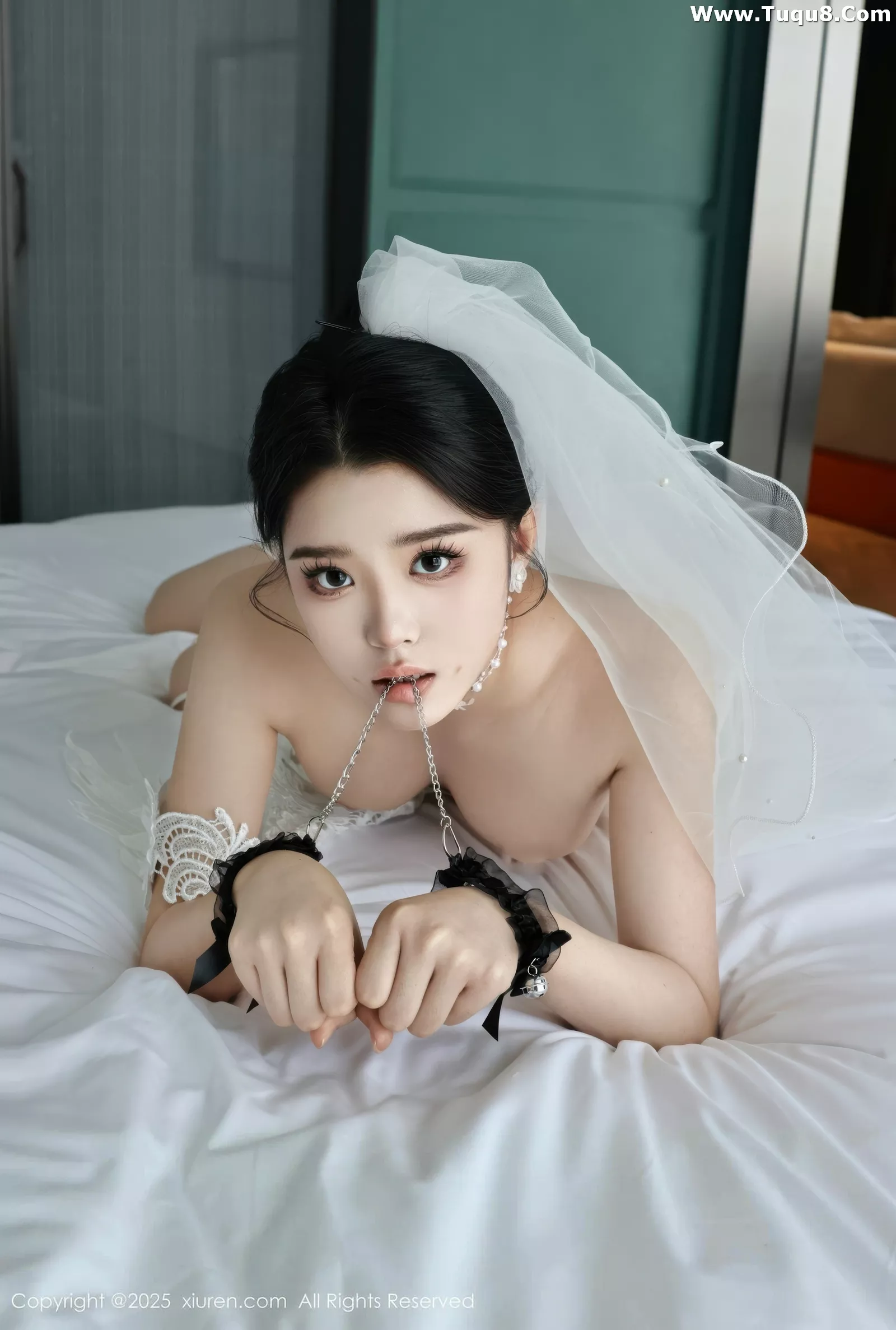   [XiuRen]高清写真图 2025.07.18 No.10559 糯梨子 白色婚纱第47张图片