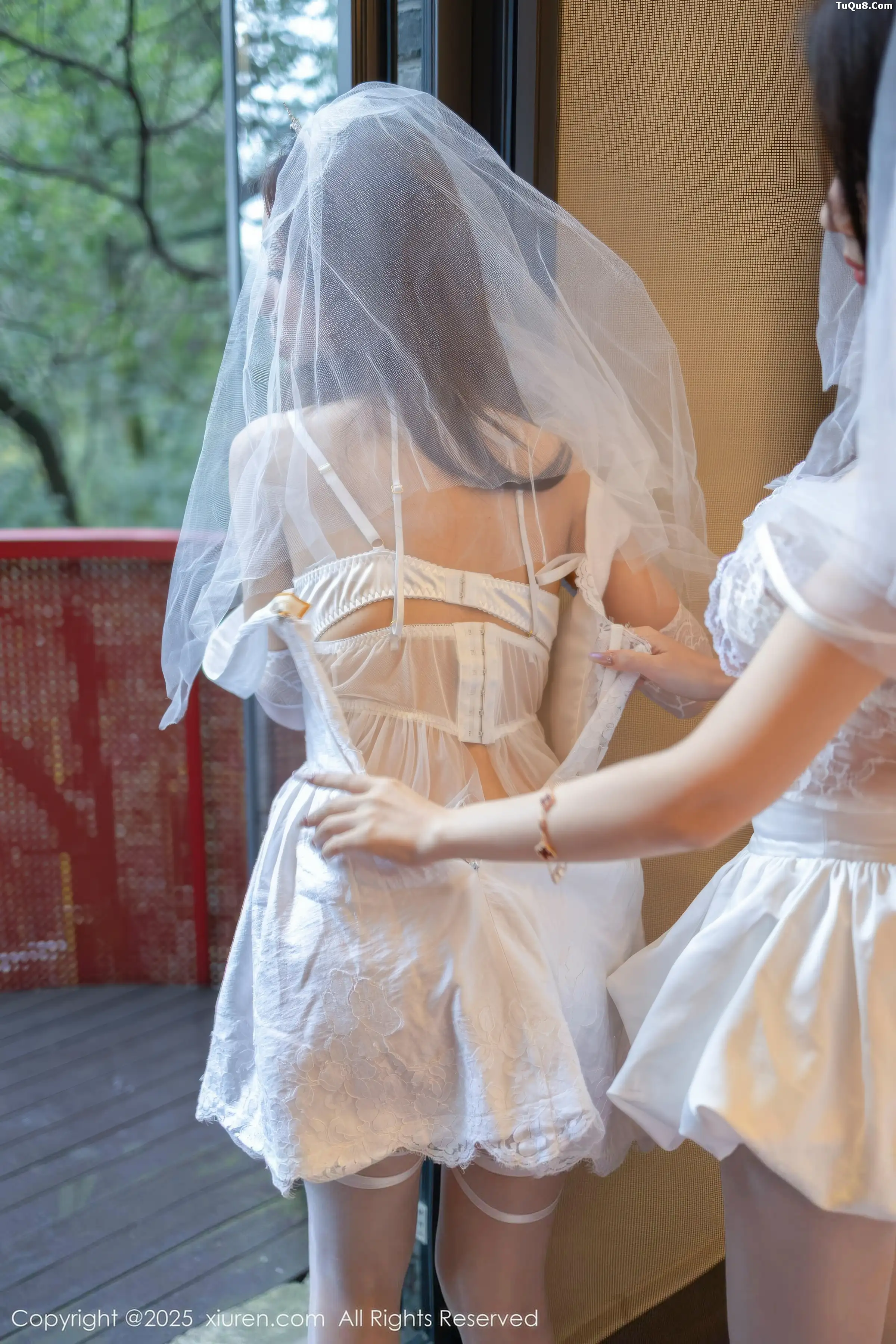   [XiuRen]高清写真图 2025.12.31 No.11184 Twins-桃之夭夭 白色蕾丝婚纱第22张图片