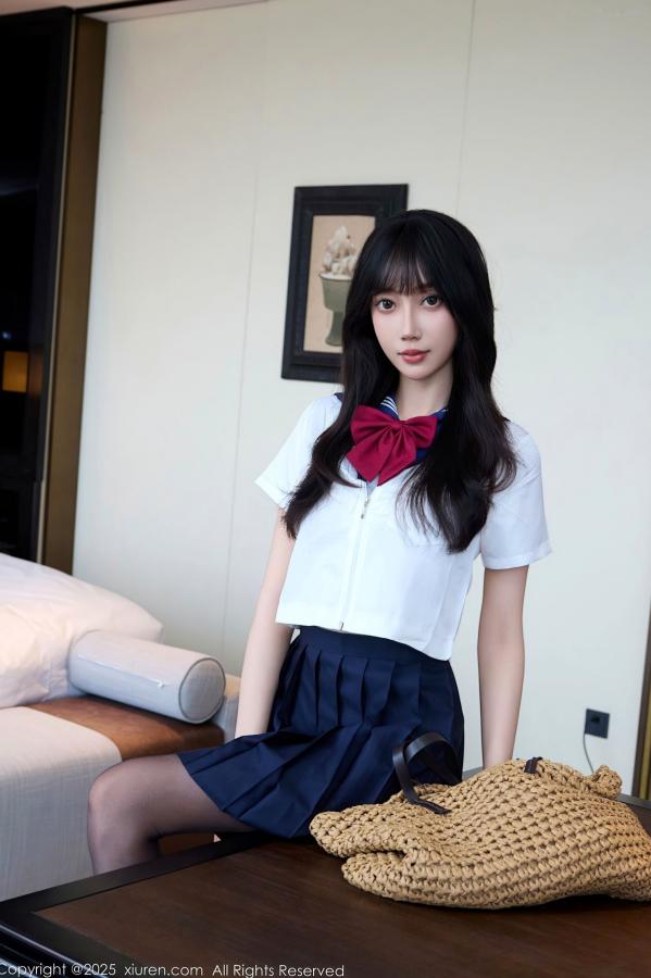    [秀人网XiuRen] NO.10766 玥儿玥er - 学院风JK水手服与黑丝美腿室内私房写真第2张图片