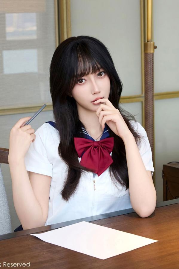    [秀人网XiuRen] NO.10766 玥儿玥er - 学院风JK水手服与黑丝美腿室内私房写真第21张图片