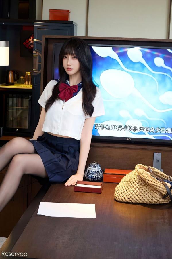    [秀人网XiuRen] NO.10766 玥儿玥er - 学院风JK水手服与黑丝美腿室内私房写真第27张图片