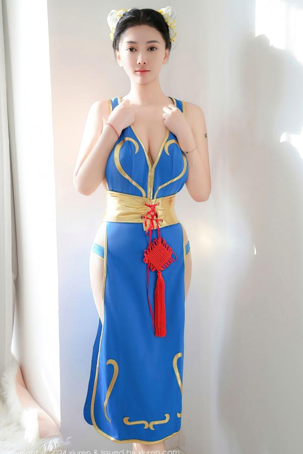    秀人网9252 雅茹老师绝美春丽cosplay，性感爆乳室内写真，高颜值女神火辣演绎蓝衣诱惑第1张图片