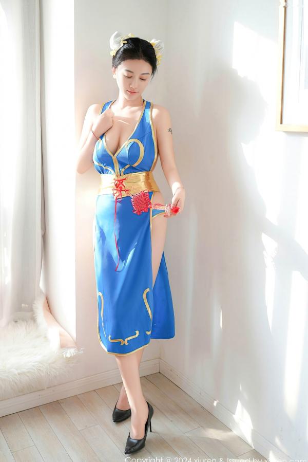    秀人网9252 雅茹老师绝美春丽cosplay，性感爆乳室内写真，高颜值女神火辣演绎蓝衣诱惑第7张图片