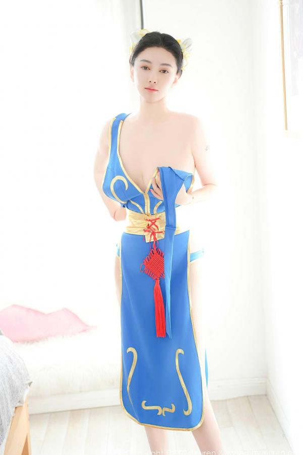    秀人网9252 雅茹老师绝美春丽cosplay，性感爆乳室内写真，高颜值女神火辣演绎蓝衣诱惑第14张图片