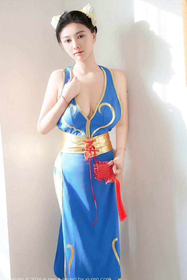    秀人网9252 雅茹老师绝美春丽cosplay，性感爆乳室内写真，高颜值女神火辣演绎蓝衣诱惑第44张图片
