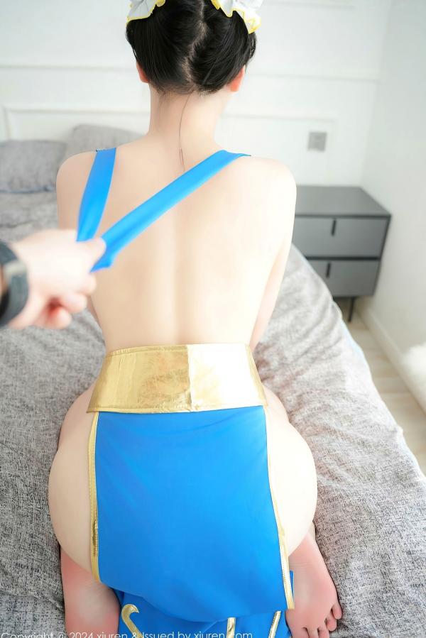    秀人网9252 雅茹老师绝美春丽cosplay，性感爆乳室内写真，高颜值女神火辣演绎蓝衣诱惑第52张图片