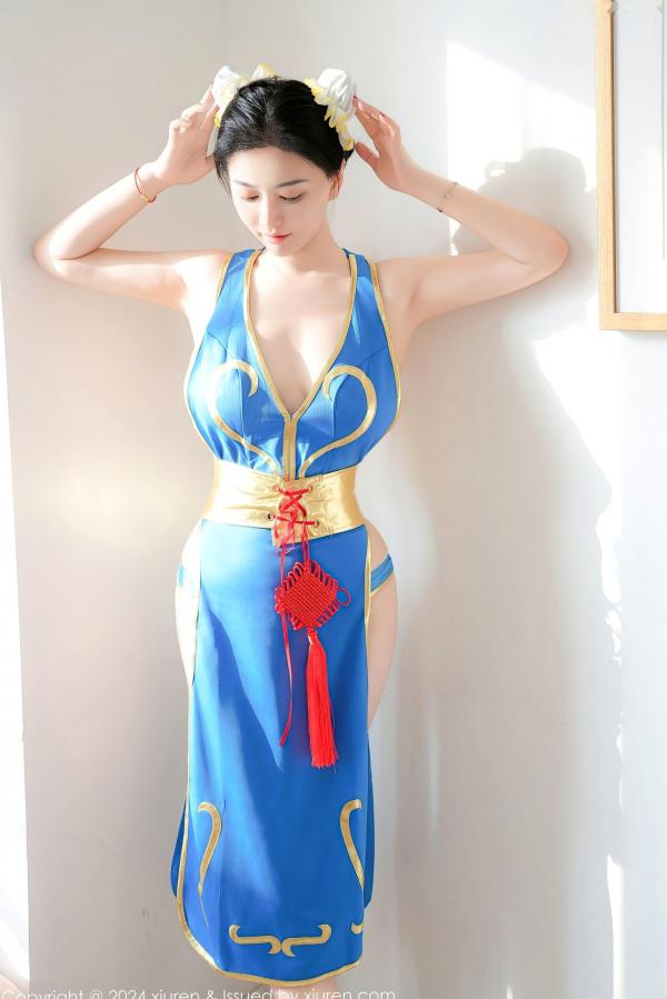    秀人网9252 雅茹老师绝美春丽cosplay，性感爆乳室内写真，高颜值女神火辣演绎蓝衣诱惑第55张图片