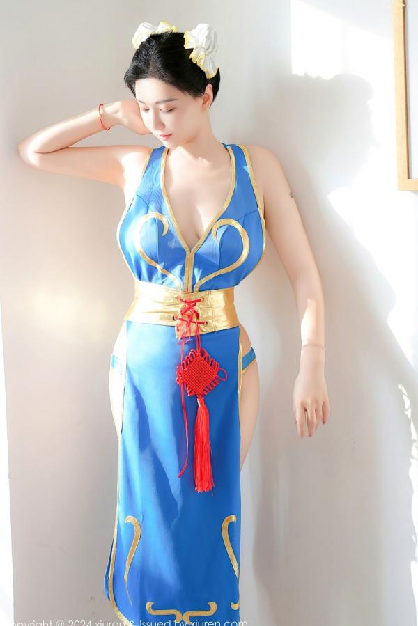    秀人网9252 雅茹老师绝美春丽cosplay，性感爆乳室内写真，高颜值女神火辣演绎蓝衣诱惑第58张图片