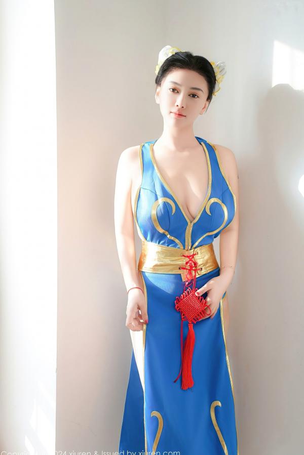    秀人网9252 雅茹老师绝美春丽cosplay，性感爆乳室内写真，高颜值女神火辣演绎蓝衣诱惑第59张图片