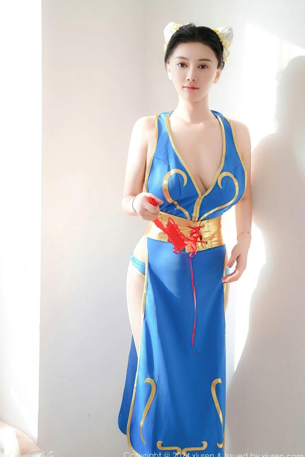    秀人网9252 雅茹老师绝美春丽cosplay，性感爆乳室内写真，高颜值女神火辣演绎蓝衣诱惑第60张图片