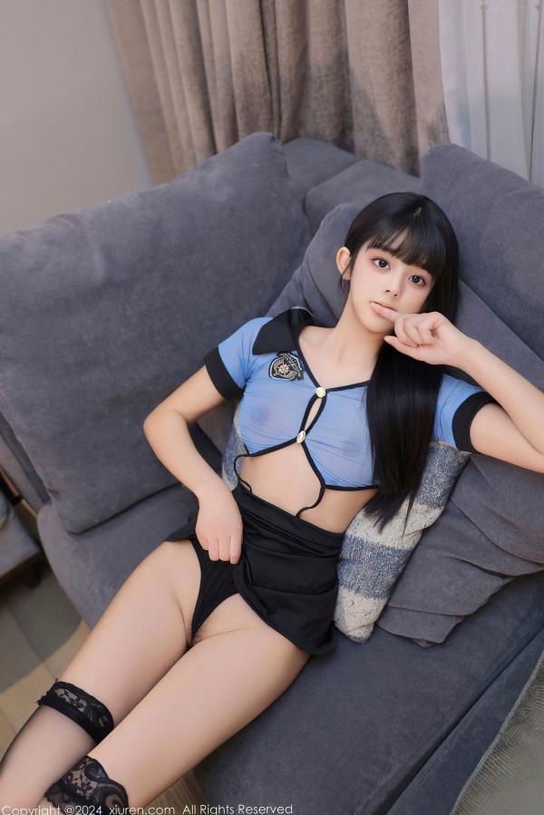    XiuRen秀人网8584-美少女大胆出镜，情趣女警制服Cosplay，蓝纱轻透T恤搭配诱惑黑丝，展现极致火辣身材与迷人私房魅力，2024.05.23高清写真第49张图片