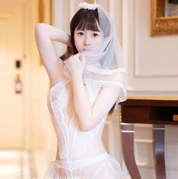    秀人网林悠悠：纯白蕾丝情趣婚纱私房写真，清纯头纱下的极致诱惑与曼妙曲线展露第21张图片