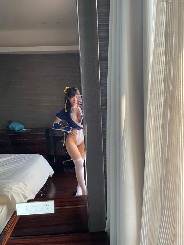    钛合金TiTi街头霸王春丽Cosplay私房照：大胆改良版战袍，尽显性感诱惑与角色魅力第13张图片