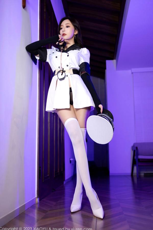 王馨瑶   XiaoYu语画界1103期：王馨瑶yanni制服诱惑系列，军装制服配黑色内衣与手铐互动，尽显冷艳御姐的大尺度角色扮演私房写真第13张图片