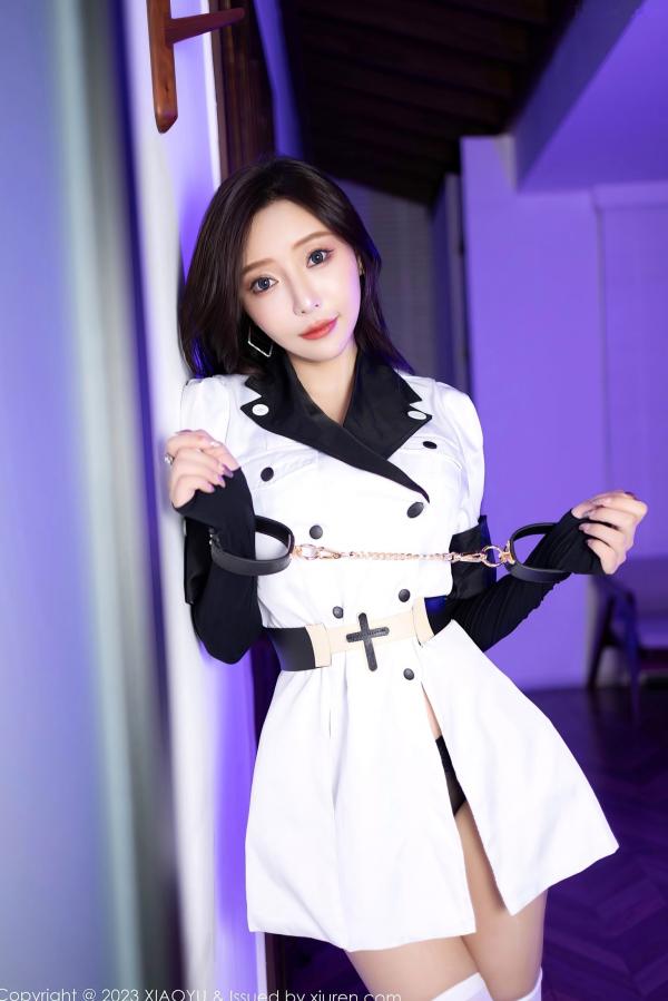 王馨瑶   XiaoYu语画界1103期：王馨瑶yanni制服诱惑系列，军装制服配黑色内衣与手铐互动，尽显冷艳御姐的大尺度角色扮演私房写真第15张图片