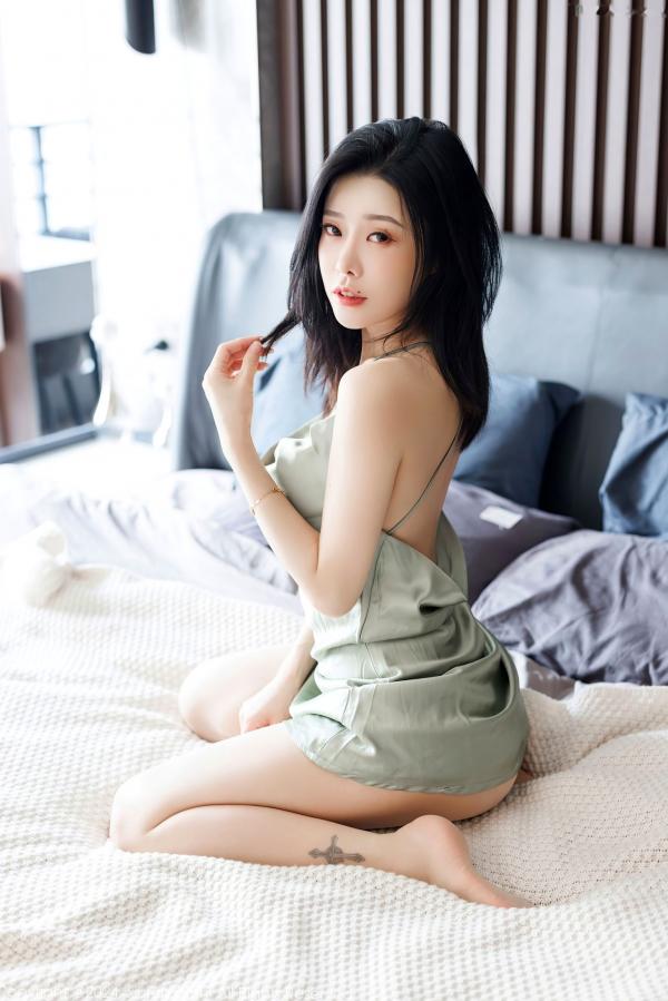 李凯诗 luvian本能  秀人网luvian本能私房写真：红色性感内衣与浅绿色吊带裙交织，极致身材展现诱惑魅力第5张图片