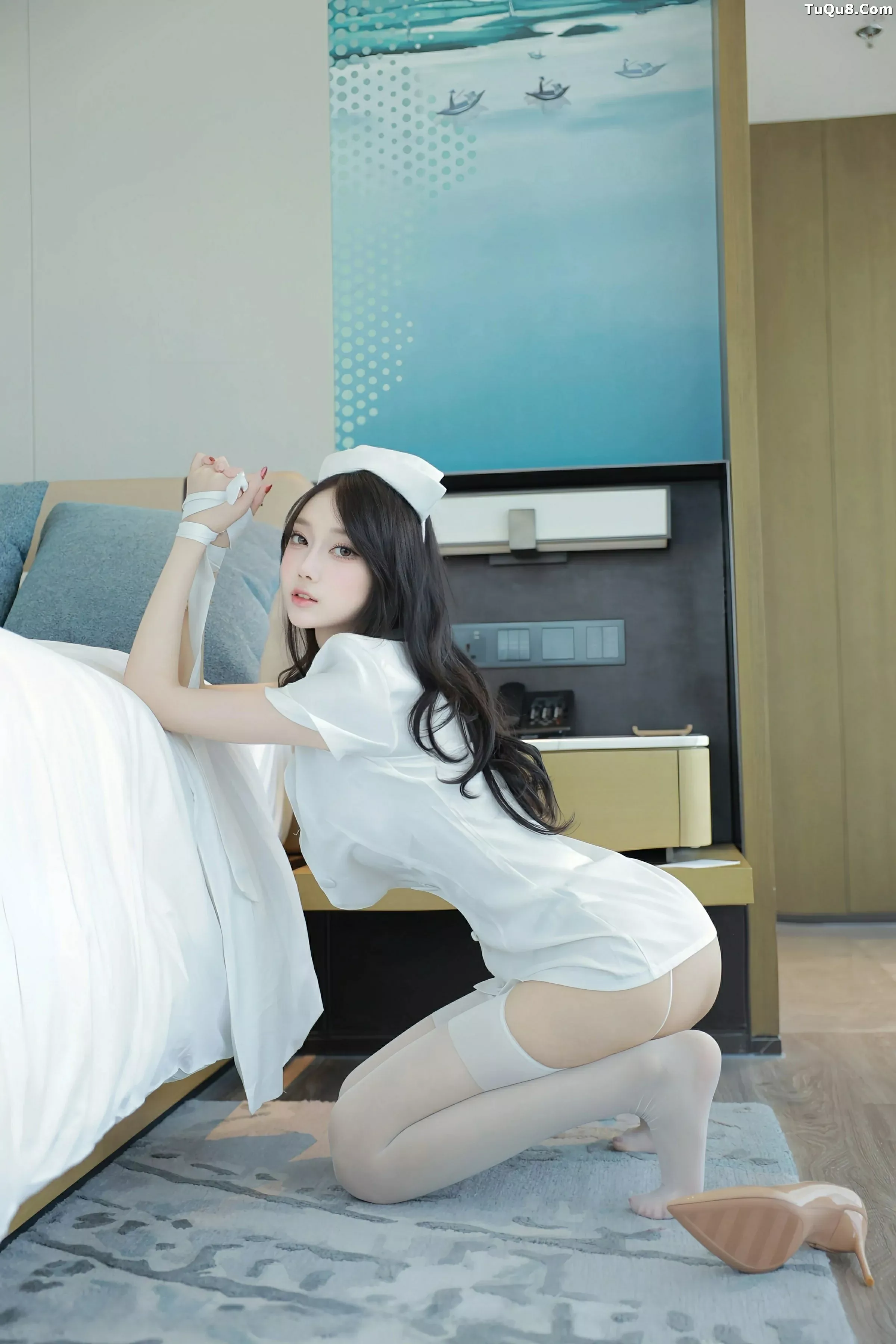 玥儿玥  [XiuRen]高清写真图 2025.07.04 No.10507 玥儿玥er 白色护士第18张图片