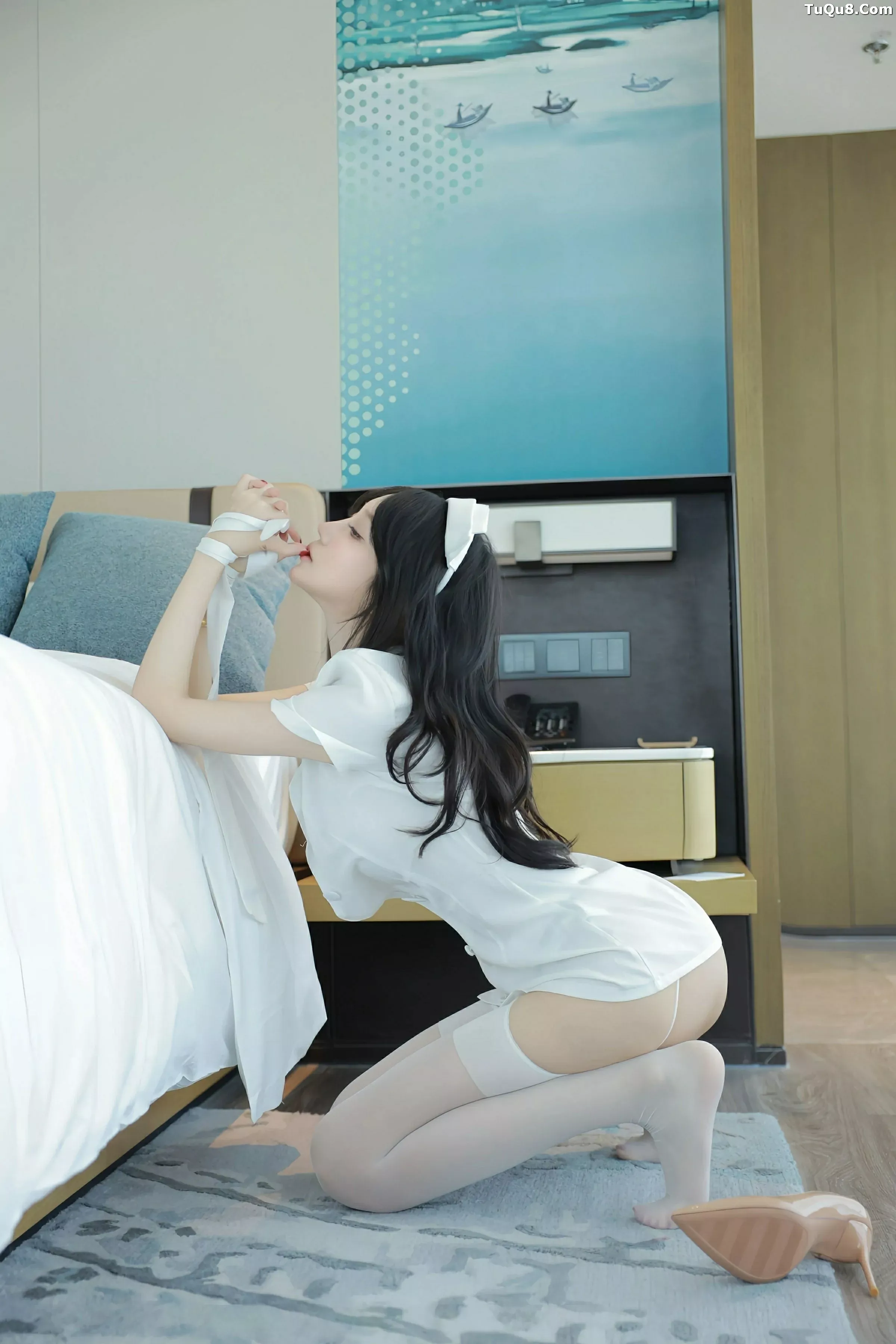 玥儿玥  [XiuRen]高清写真图 2025.07.04 No.10507 玥儿玥er 白色护士第22张图片